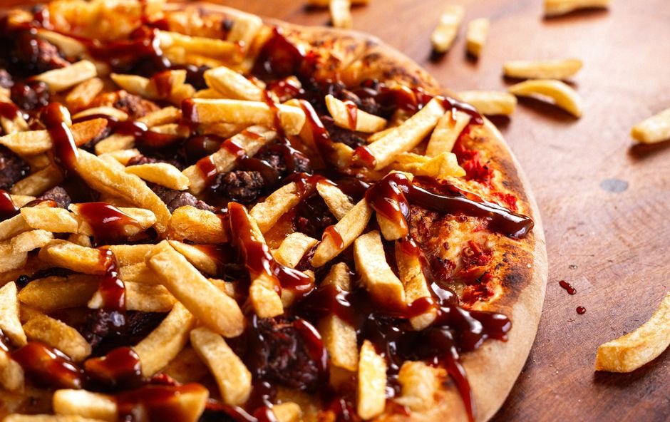 Sonhar com pizza de sabor estranho